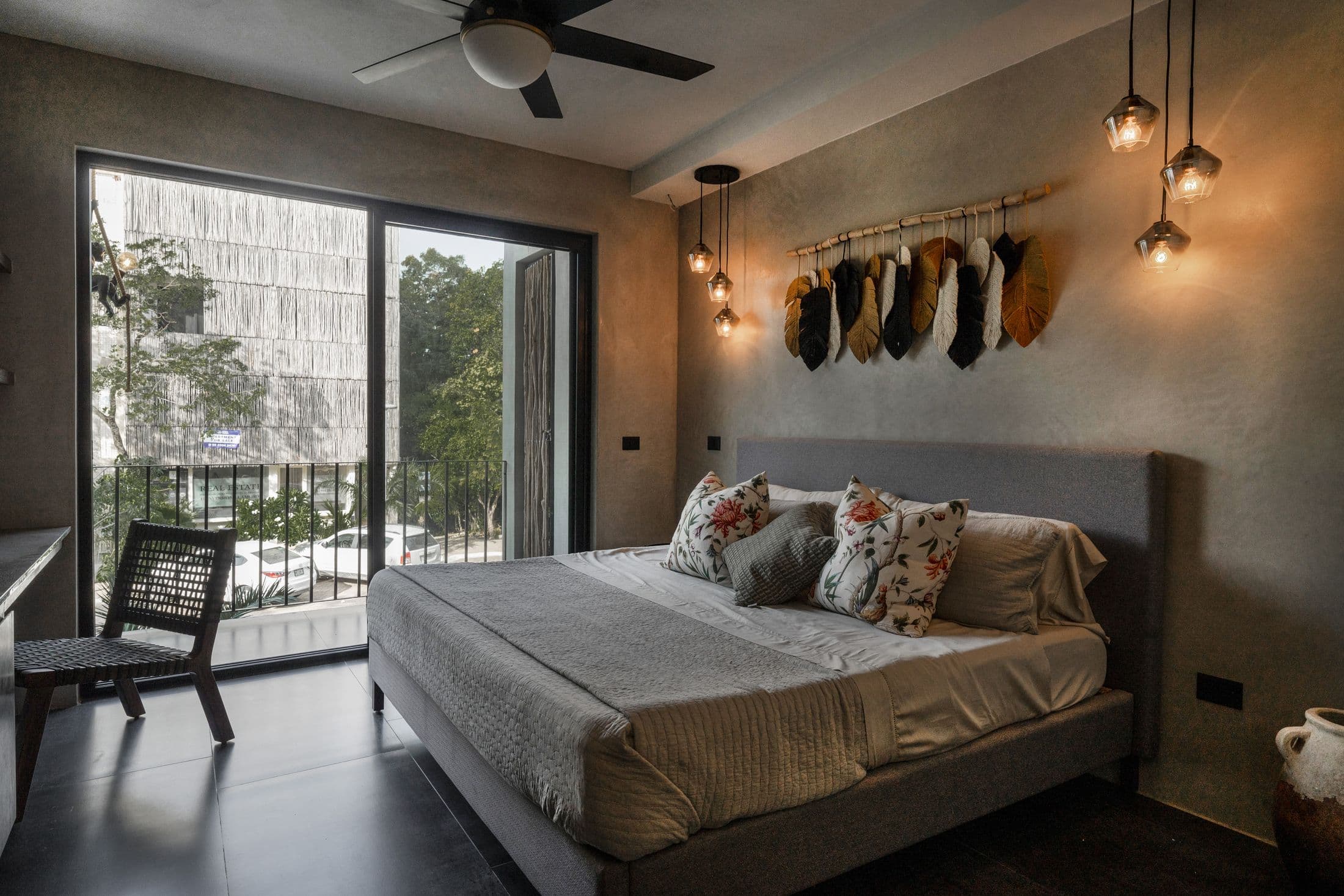 Second bedroom with pendant lights