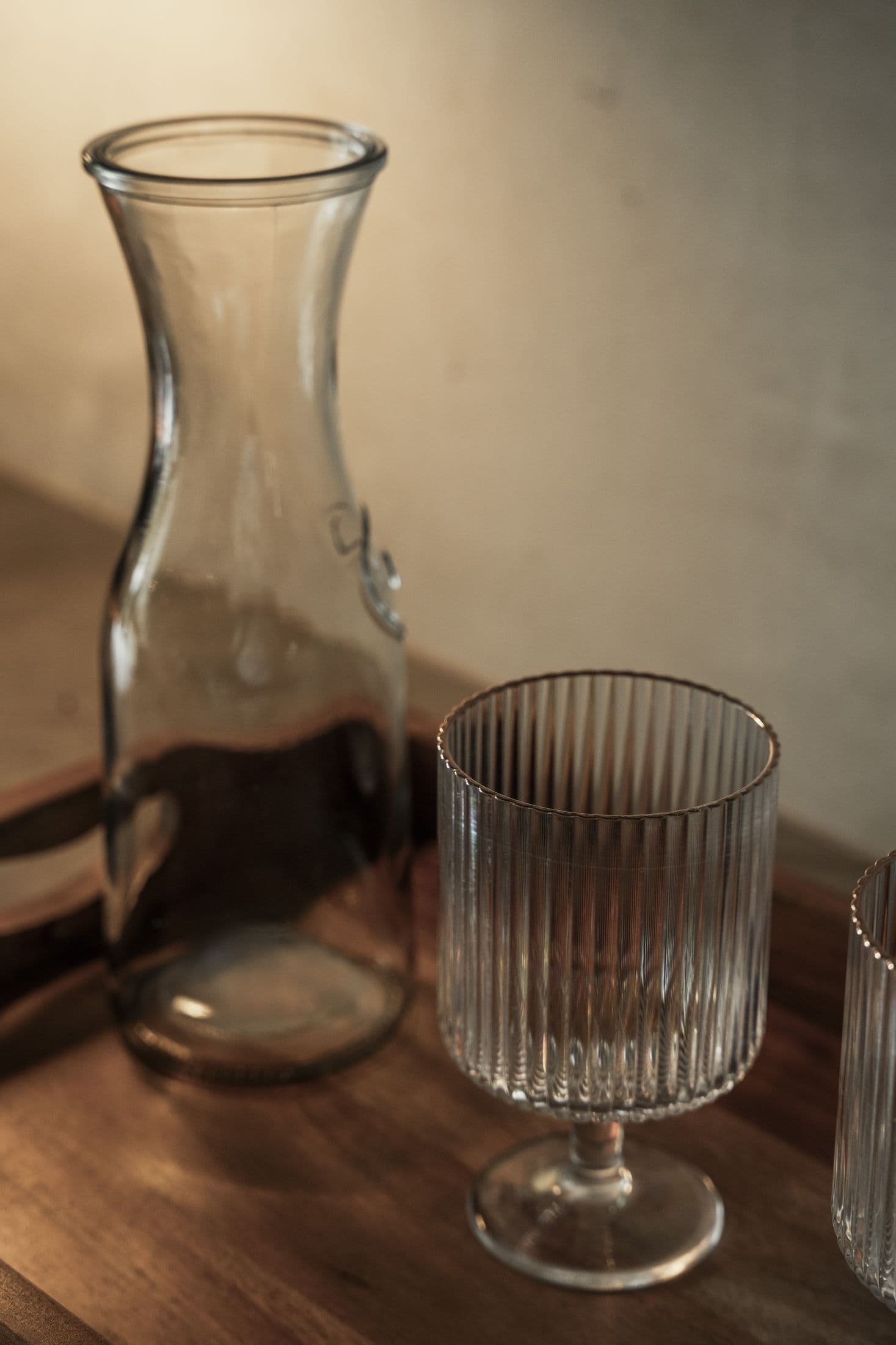 Glass carafe on a wood counter