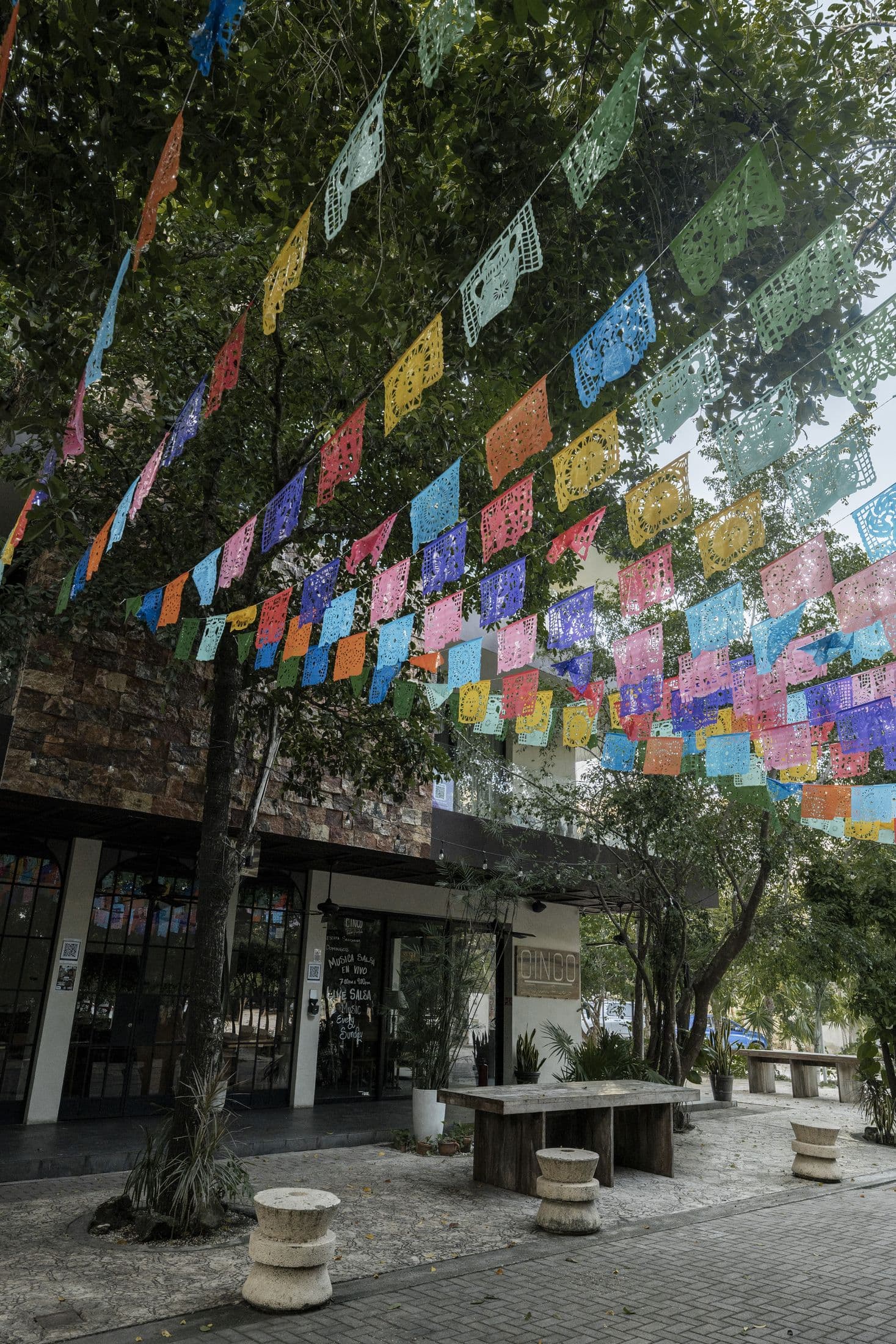 Papel picado over the Aldea Zamá walkway